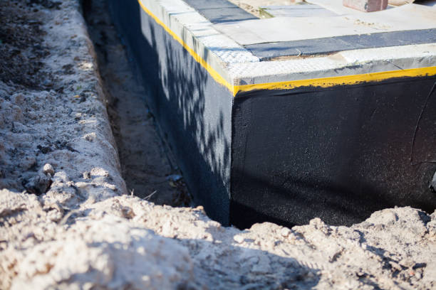 Professional Emergency Waterproofing technician working in Marcellus, NY